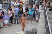 Naked babe in a crowded public area