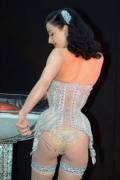 Dita in a sequined corset
