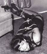 Bettie Page tied up and ball gagged.