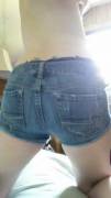 Bulge and reveal in denim shorts