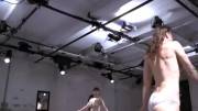 Synchronised naked walking/stripping - from "beginning of something" performance art