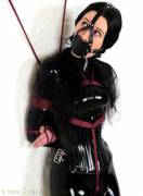 Catsuit, corset gag and rope