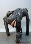 Heavy rubber for a male slave