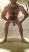 Massaging showerheads, a beer, and a really hairy guy. What more could you want?