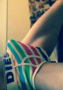 Boner in rainbow striped briefs
