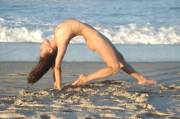 Nude Yoga on the beach.