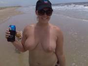 Her big tits on display at the beach