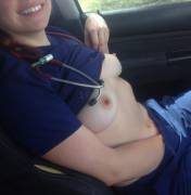 Nurse taking a break in her car.