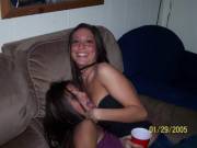 Drunkenly licking her friend's breast