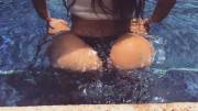Kim Kardashian twerking in a thong bikini