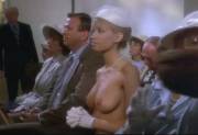 Amazon Women on the Moon: Erotic actress and nudist Taryn Steele (Monique Gabrielle) attends church.”