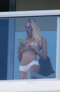 Laura Cremaschi - Topless on her hotel balcony in Miami