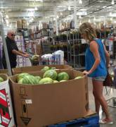 He's checking out her melons.