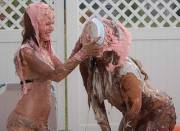 Girls covered in pie
