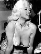 One of Jayne Mansfield's famous "nip-slips" ~ 1957