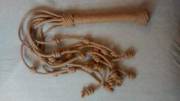 My favorite cat o' nine tails. Just a steel rod, five lengths of rope, and some crafty knotwork.