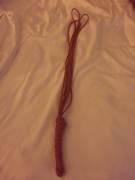 On vacation.. took plenty of rope, but not enough spanking instruments, so I made my first paracord flogger!