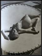 Andre De Dienes - (not) Marilyn Monroe lying naked on a trampoline, 1953