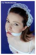 Brunette in lacy gear with a cloth gag