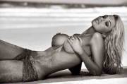 Topless on a beach.