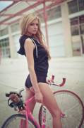 Pretty girl and her bike.