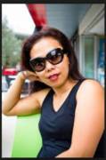 Asian milf with some shades.