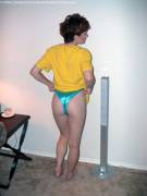 Pulling turquoise panties tight