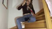 Soaking her jeans on the stairs