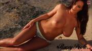 Stacey Poole posing at the beach