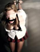 Schoolgirl, bound, gagged and blindfolded