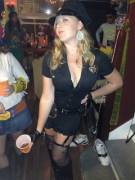 Hotwife's slutty cop costume at a vanilla party