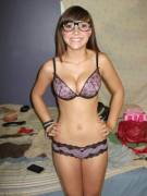Tiny, cute, busty, with glasses