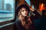Gorgeous curls on a train