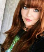 Gorgeous redhead with killer bangs