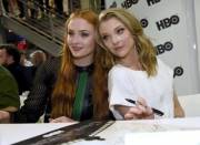 Sophie and Natalie end a day of signing with getting their faces signed by fans (x-post from /r/celebcumsluts)