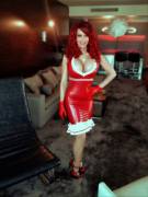 Bianca in tight latex red dress.