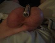 My massive balls compared to an AA battery