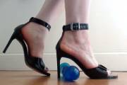 black heels and a toy