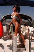 Glorious brunette at the helm