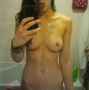 Proud of her drenched chest! (Via /r/cumshotselfies)