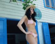 Elizabeth Gillies looking hot in a pink bikini.