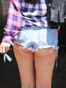 A close-up of Selena Gomez's ass in shorts