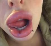 Alexia licking her injected lips!