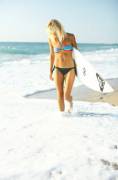 Slim blonde surfer chick