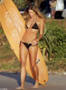 Elle Macpherson takes her board out