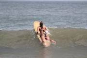 NJ SurfGirl Paddling out 