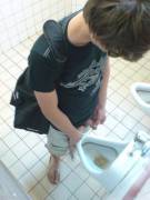 Twinky boy caught pissing