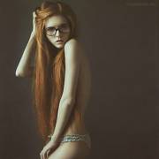Long straight red hair, slim girl in nice lingerie and glasses