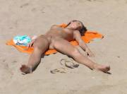 Gorgeous hardbody nude sunbathing