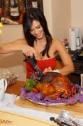 Denise carves a turkey